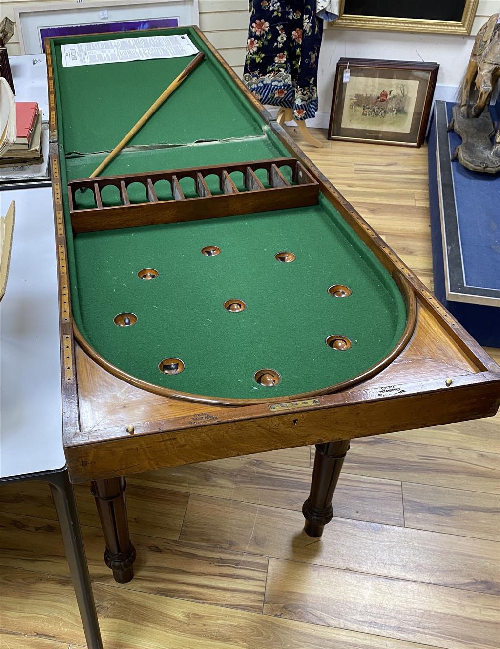 An early Victorian mahogany bagatelle table, width 120cm, depth 64cm, height 90cm